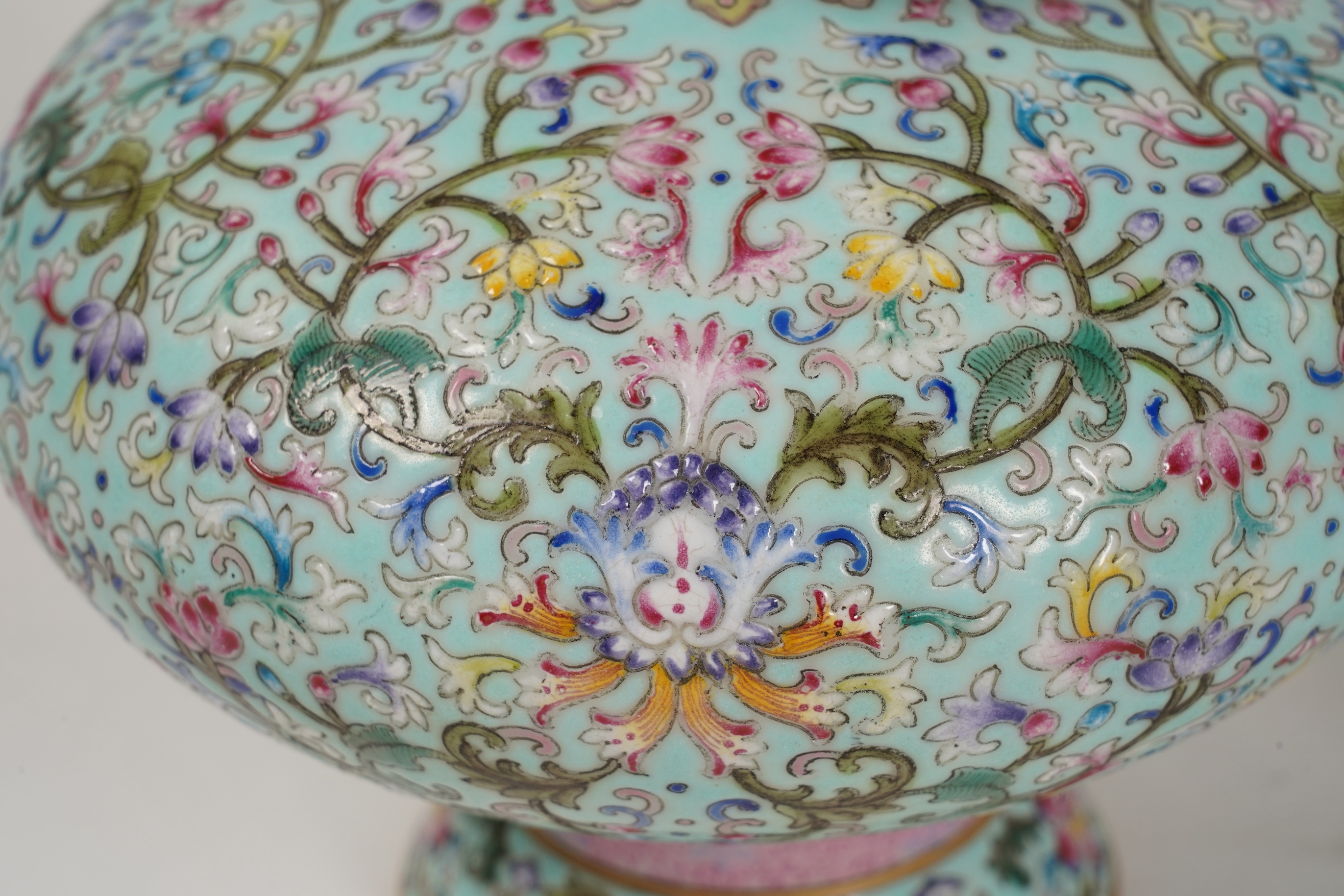 A pair of Chinese famille rose enamelled porcelain bottle vases, Qianlong seal mark to base but Republic Period